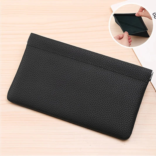 Self-closing wallet